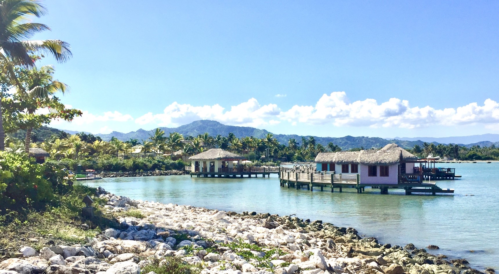 Amber Cove huts and blue water
