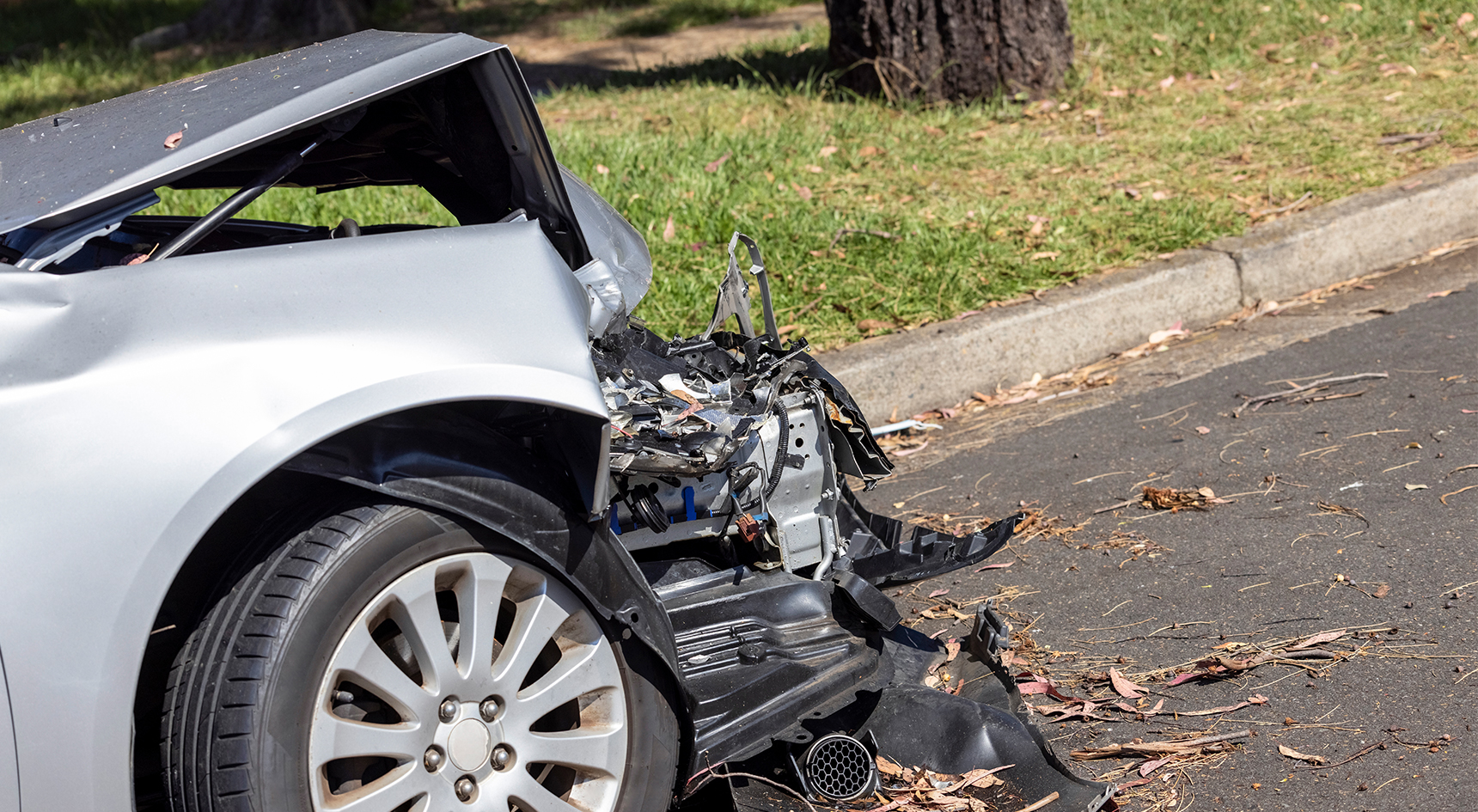 Side view of a car that's had a front end crash