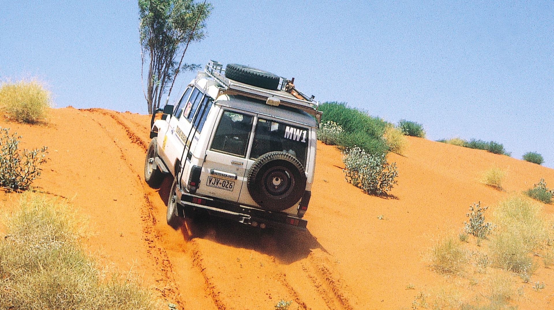 Car on sand dune