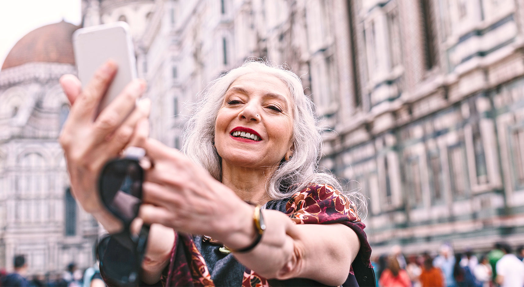 Woman taking selfie in Florence